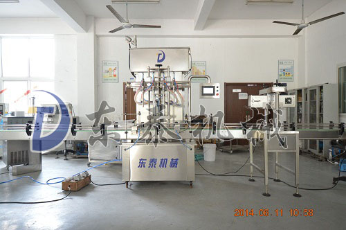 四頭全自動(dòng)食用油灌裝線